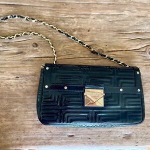 Black Versace Patent Clutch with gold metal clasp